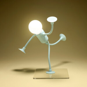 Luz nocturna creativa de taza de succión humanoide montada en la pantalla de una computadora, utilizada como lámpara de lectura o ambiente