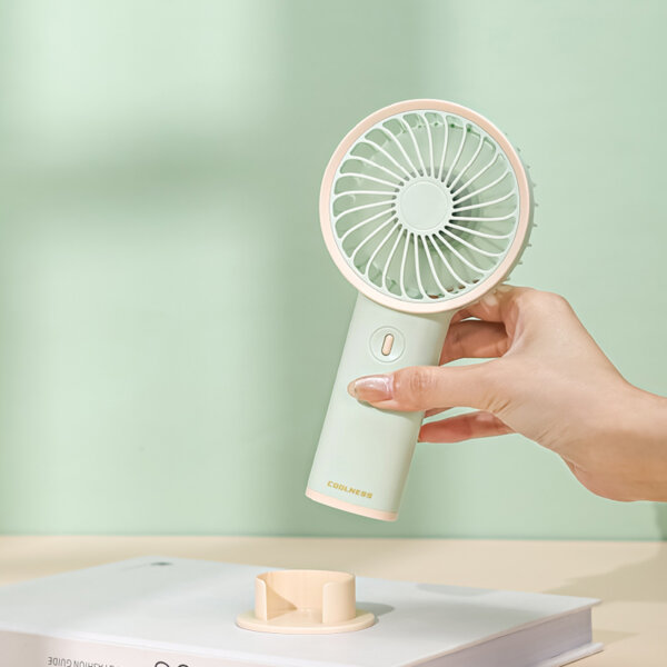 Portable handheld and desktop mini fan with pastel design