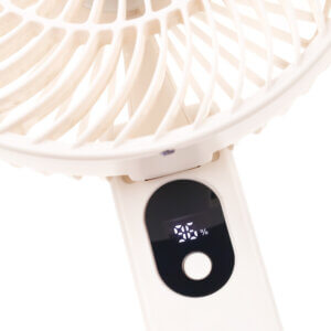 Foldable Handheld and Desktop Mini Fan, showing its stable folded desktop form and spiral front grille details.