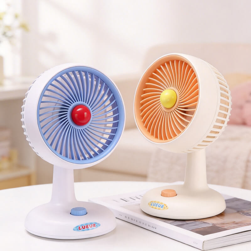 Automatic Oscillating Desktop Quiet Mini Fan, showing its white and blue two-tone appearance, spiral grille, and blue knob switch on the base.