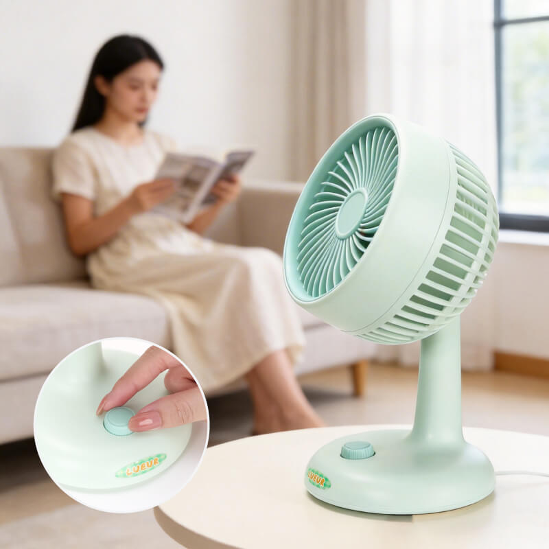 Automatic Oscillating Desktop Quiet Mini Fan, showing its white and blue two-tone appearance, spiral grille, and blue knob switch on the base.