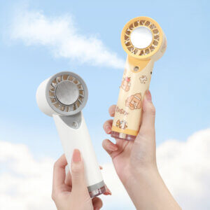 Semiconductor Ice Cooling Mist Spray Handheld Mini Fan, showing its central metal ice pad, air guide grille, fine mist nozzle below, and side control buttons, available in beige and white colorways.