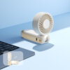 Foldable Neck and Bag Hanging High-Speed Handheld Fan, showing its beige body, folding joint, front grille, and multifunctional hanging loop structure at the bottom.
