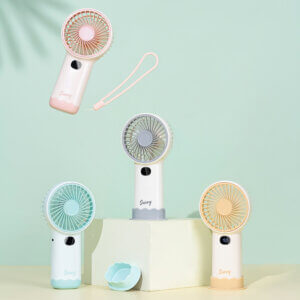 Smart Digital Display Portable Rechargeable Handheld Desktop Fan, showing its white body, warm beige front grille, LED digital display screen, side charging port, and wavy base stand.
