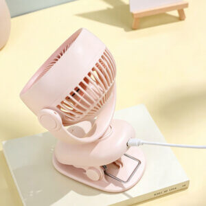 Automatic Oscillating Clip-on Desktop Mini Fan, showing its mint green appearance, spiral air guide grille, tilt-adjustable U-bracket, and clamp base with control button.