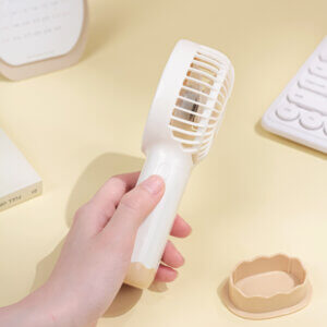 Smart Digital Display Portable Rechargeable Handheld Desktop Fan, showing its white body, warm beige front grille, LED digital display screen, side charging port, and wavy base stand.