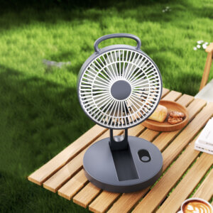 Foldable Portable Wall-Mountable Handheld Desktop Outdoor Fan, showing its top carry loop, circular fan head, folding support arm, back hook mount slot, and circular base with button.