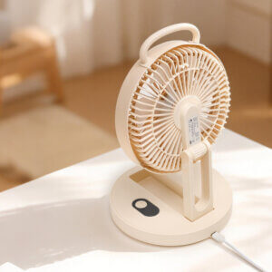 Foldable Portable Wall-Mountable Handheld Desktop Outdoor Fan, showing its top carry loop, circular fan head, folding support arm, back hook mount slot, and circular base with button.